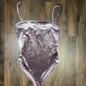 Purple velvet body suit